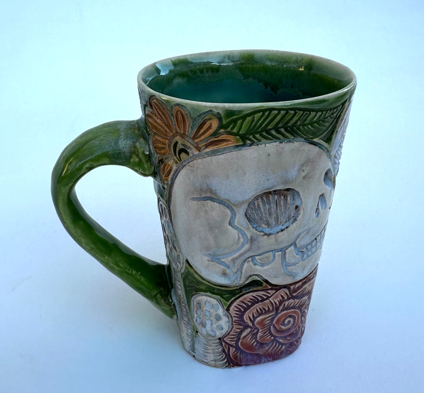 Large mug with skull, flowers, and mushrooms