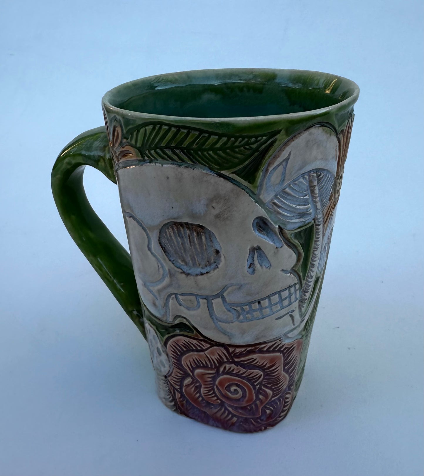 Large mug with skull, flowers, and mushrooms