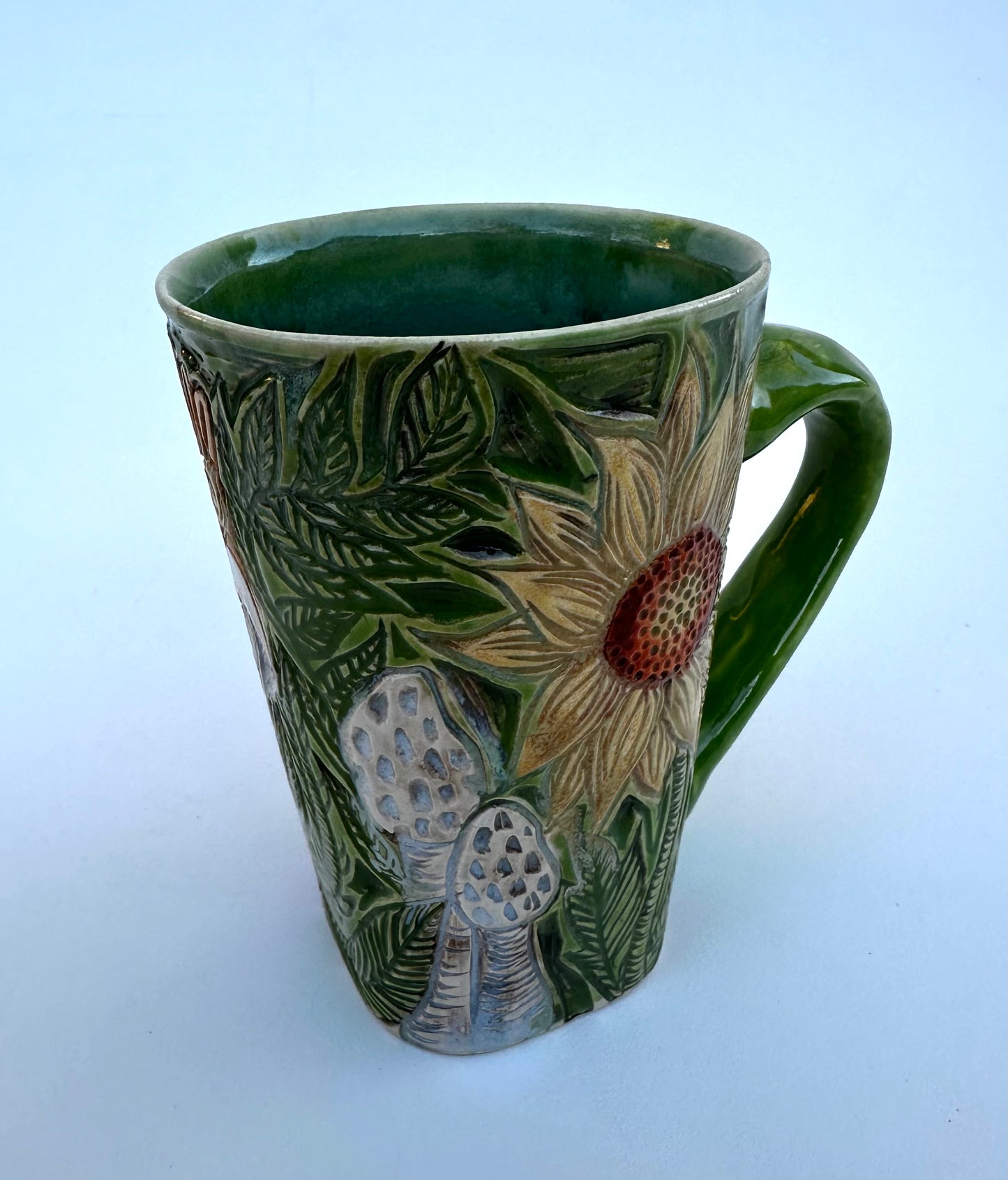 Large mug with skull, flowers, and mushrooms