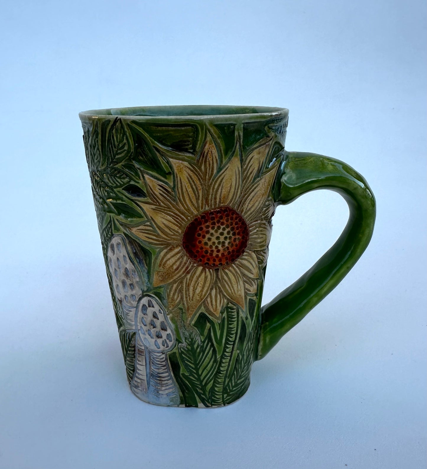 Large mug with skull, flowers, and mushrooms