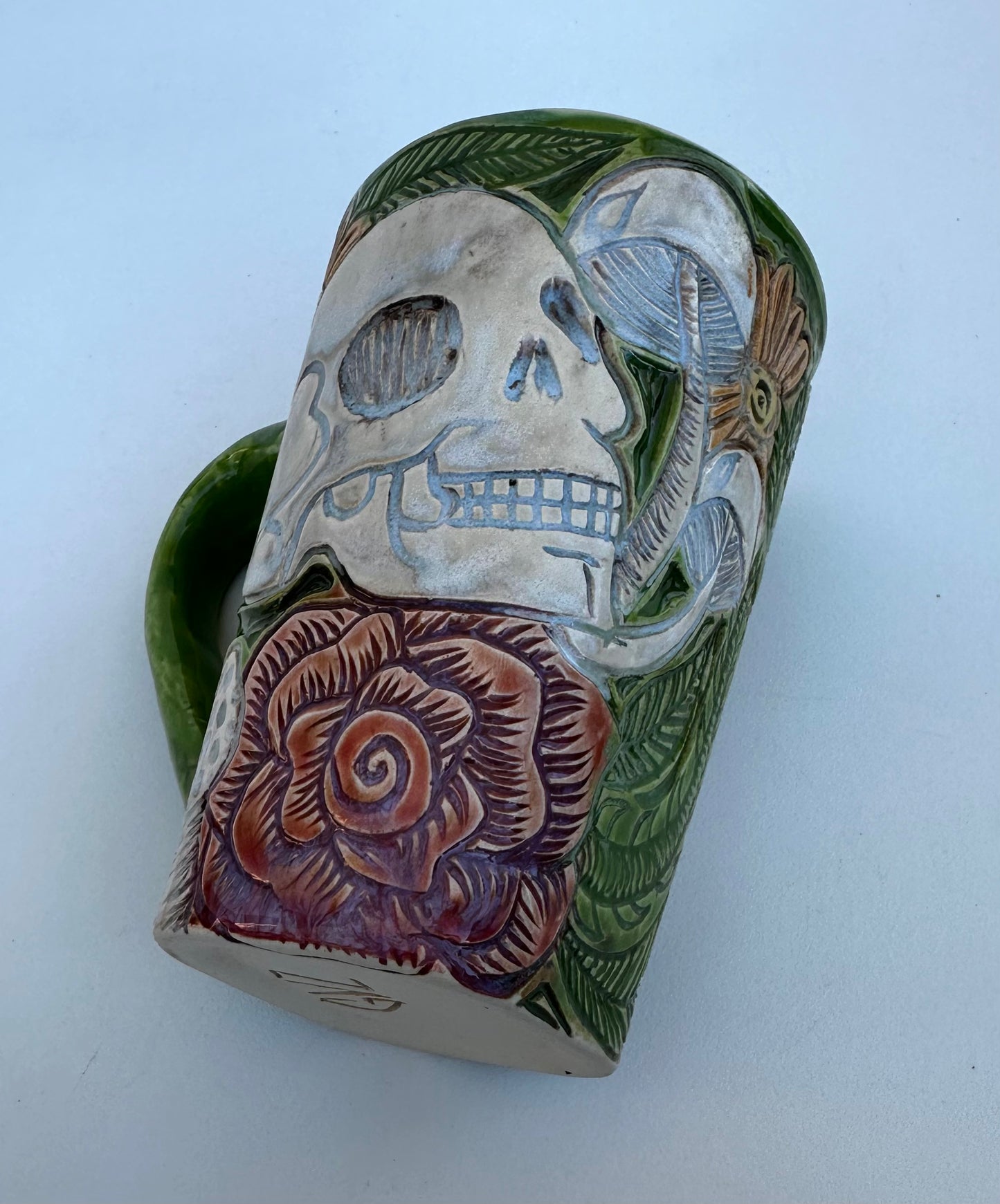 Large mug with skull, flowers, and mushrooms