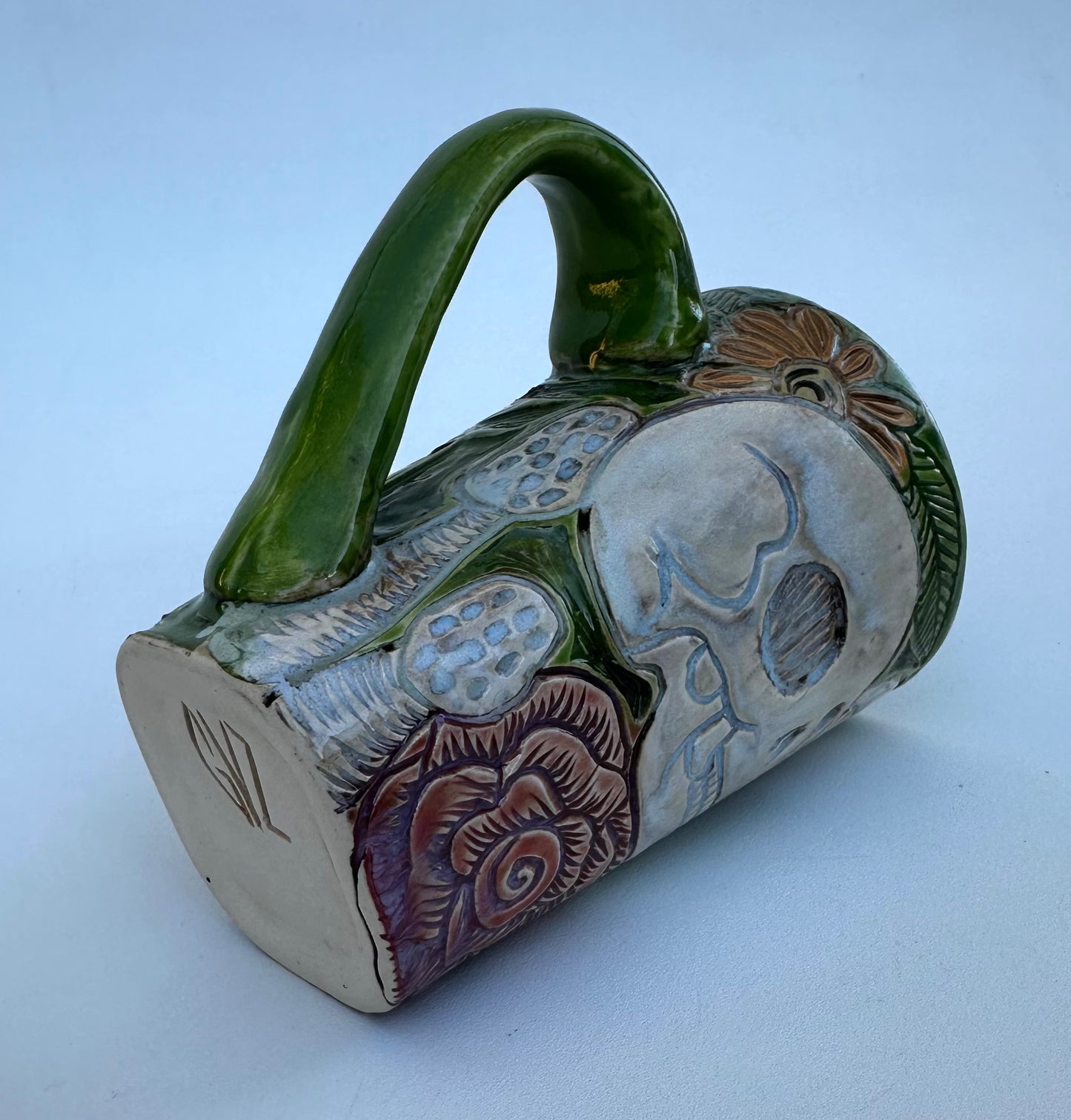 Large mug with skull, flowers, and mushrooms