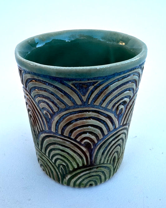 Little carved rainbow arches cup