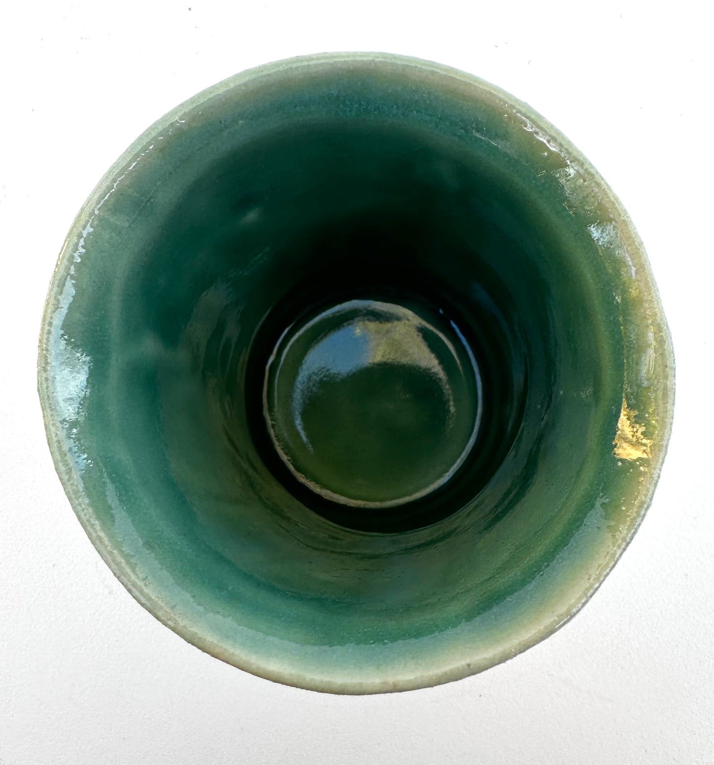 Little carved rainbow arches cup