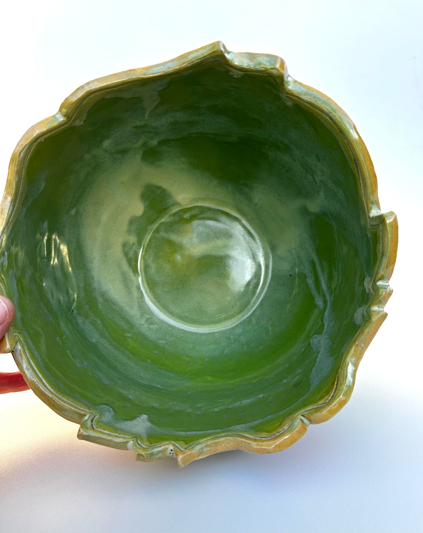 Large bowl with Amanita mushrooms, ferns, and hearts