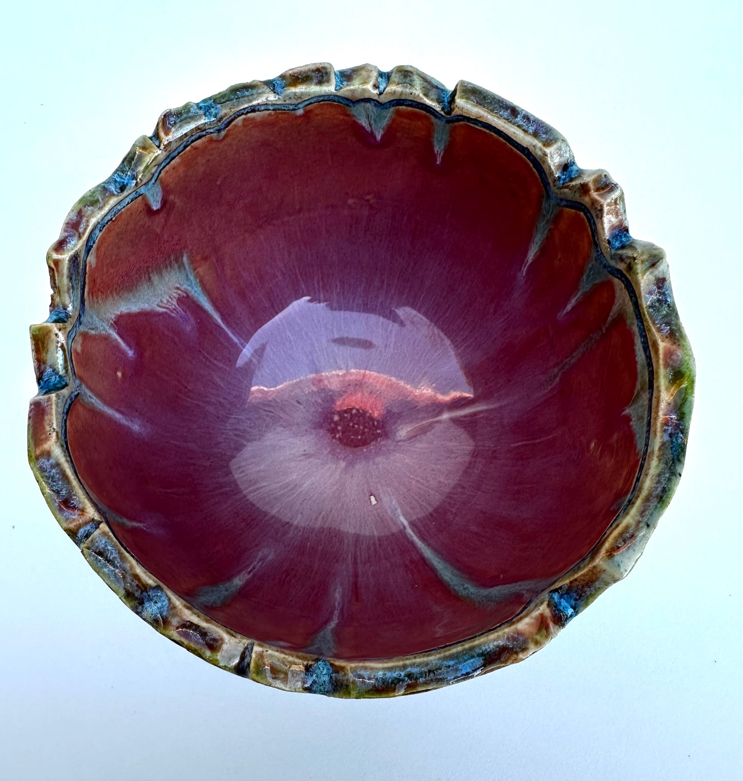Small bowl with skulls roses, and crystals