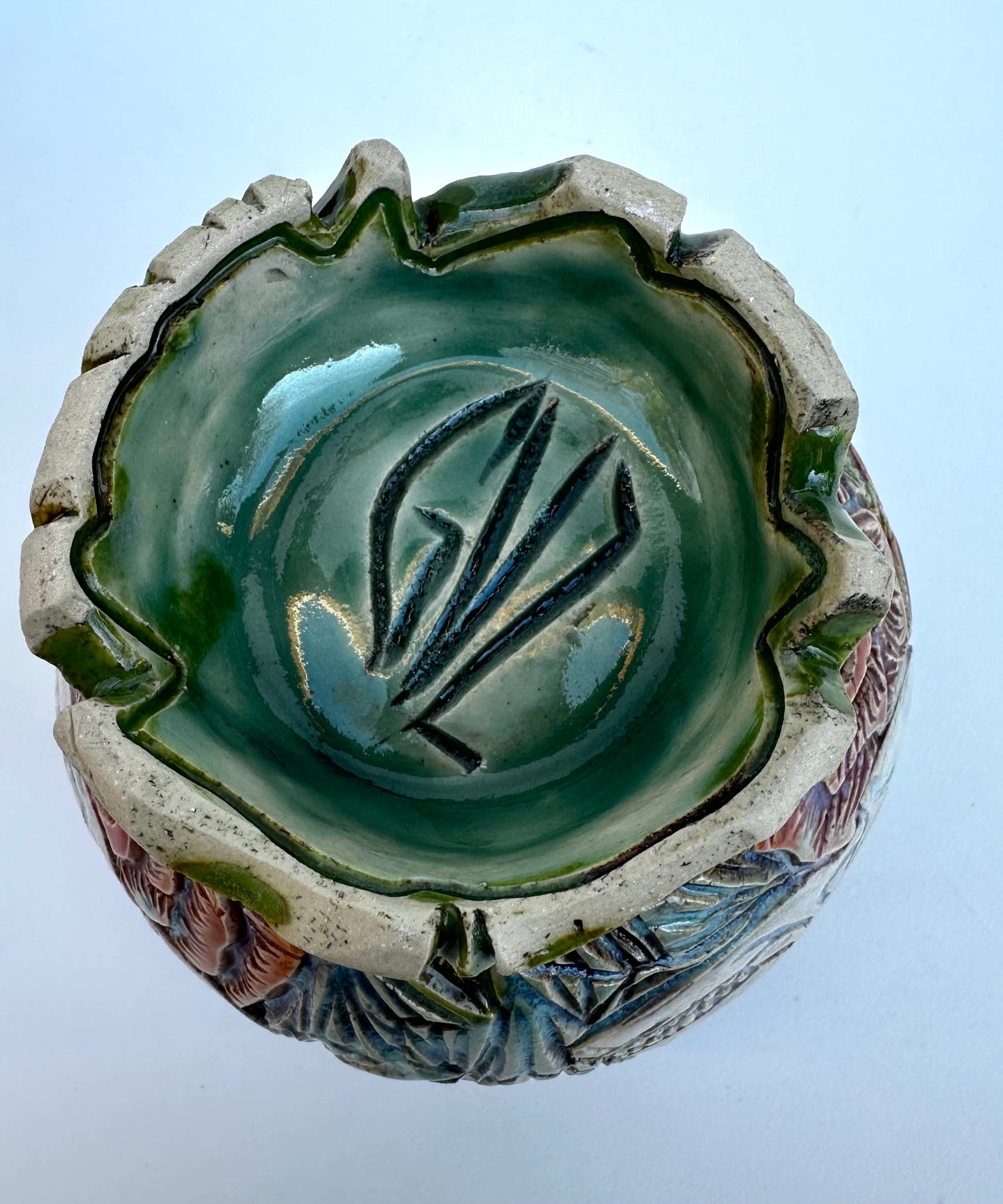 Small bowl with skulls roses, and crystals