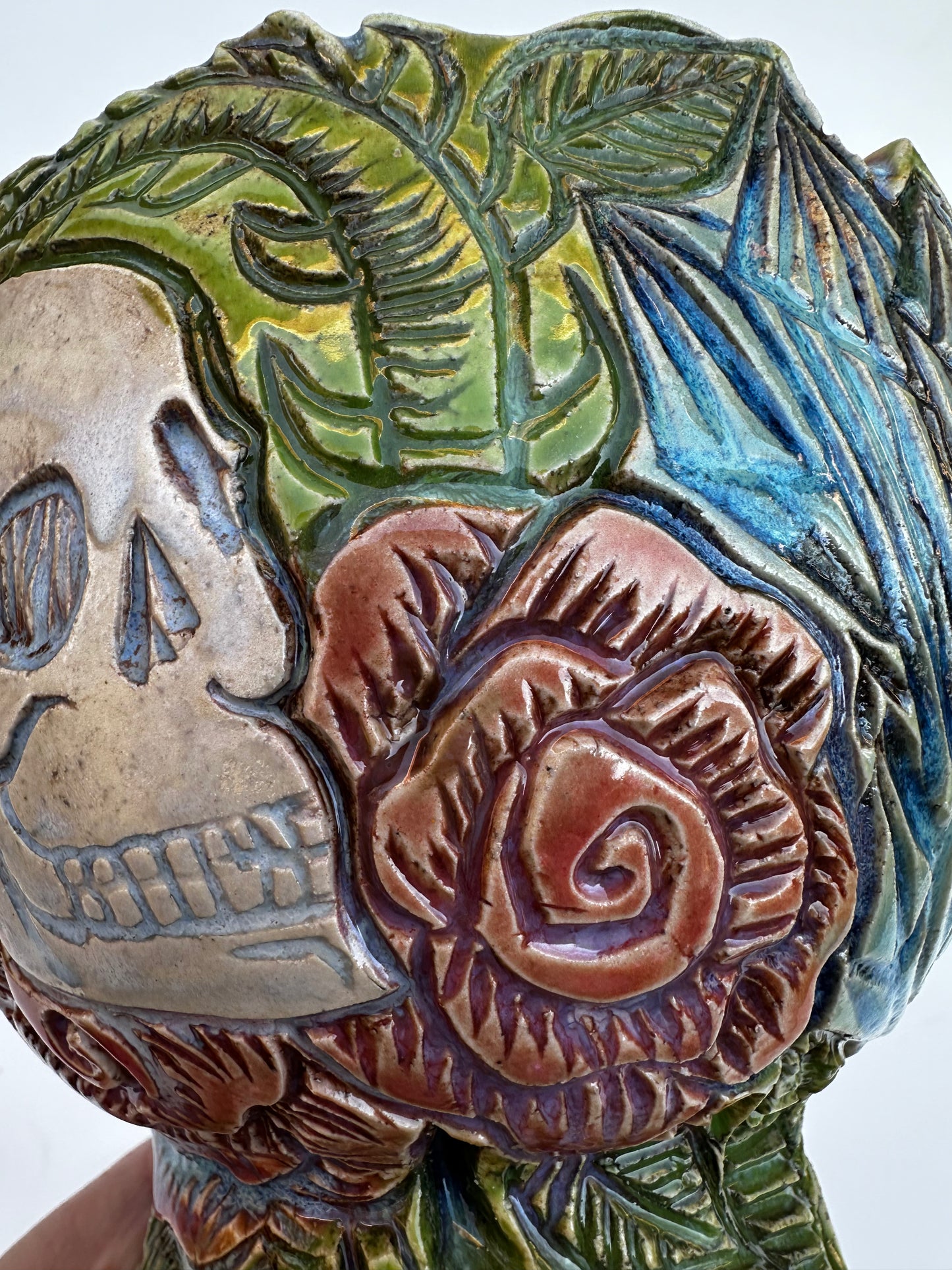 Small bowl with skulls roses, and crystals