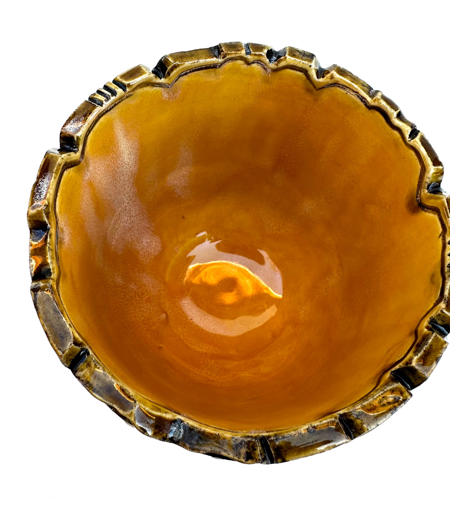 Bowl with honeybees and daisies on honeycombs