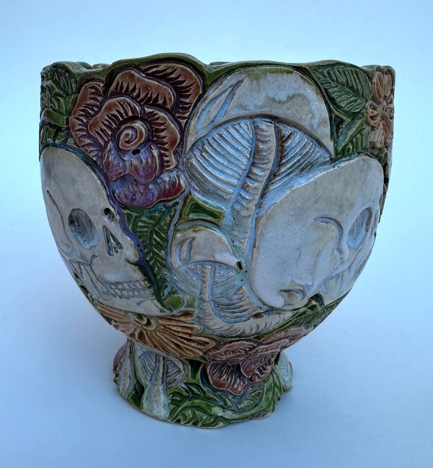 Bowl with skulls roses, daisies, and mushrooms