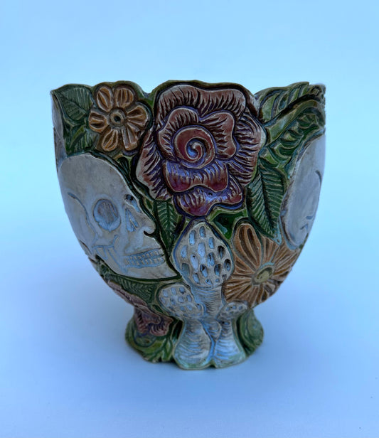 Bowl with skulls roses, daisies, and mushrooms
