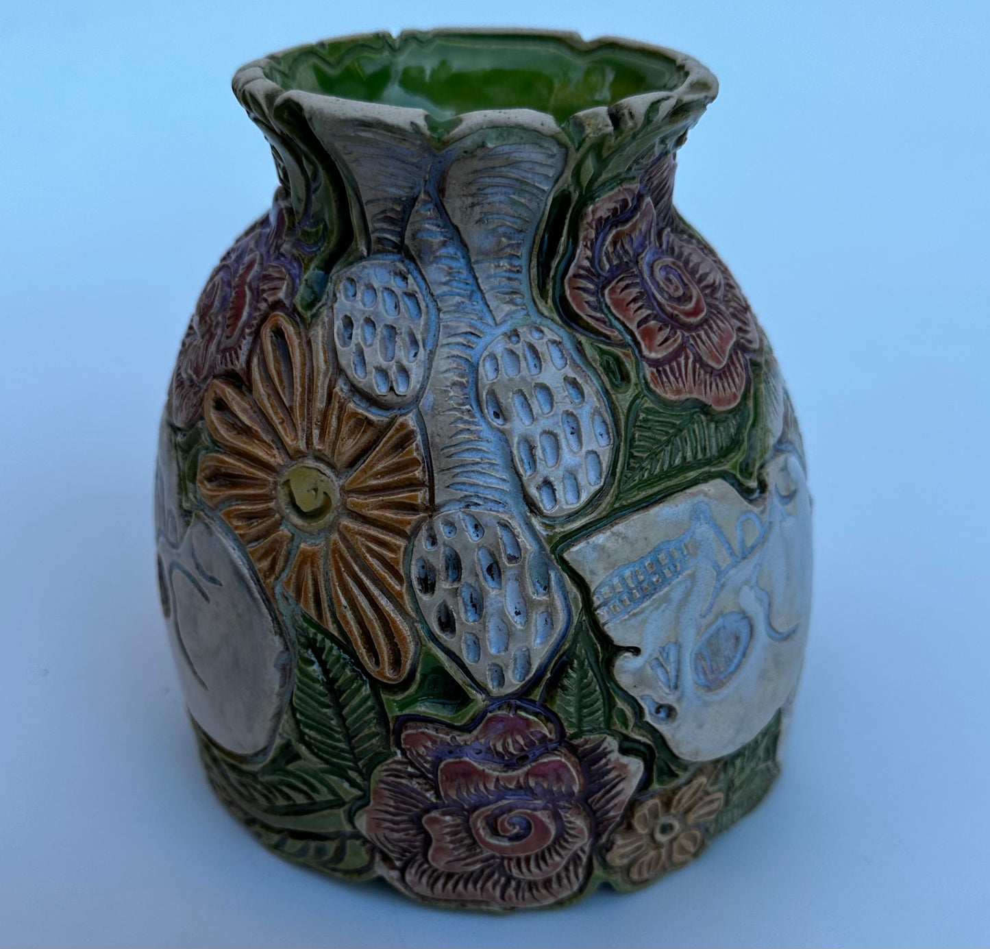 Bowl with skulls roses, daisies, and mushrooms