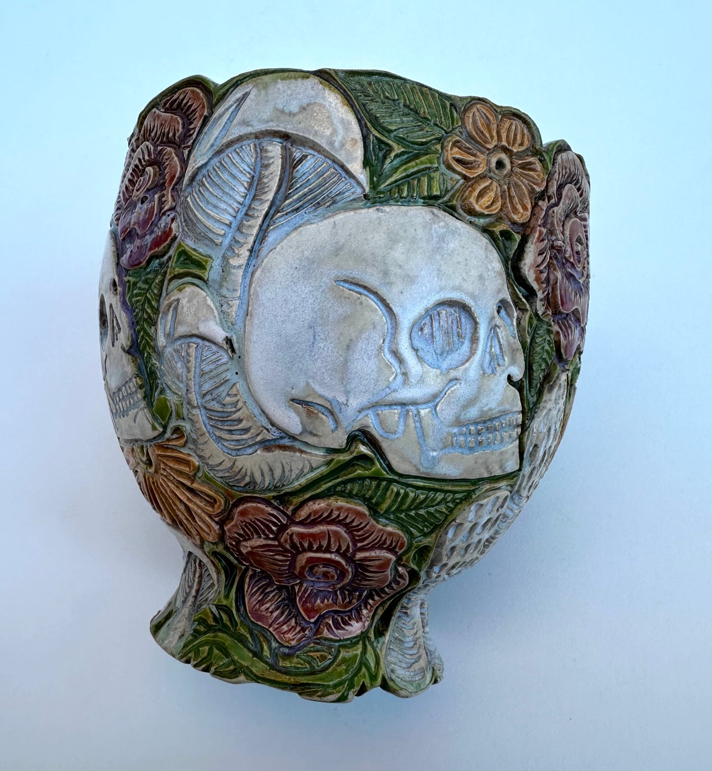 Bowl with skulls roses, daisies, and mushrooms