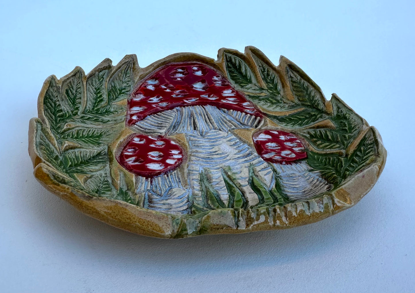 Small plate with Amanitas and ferns