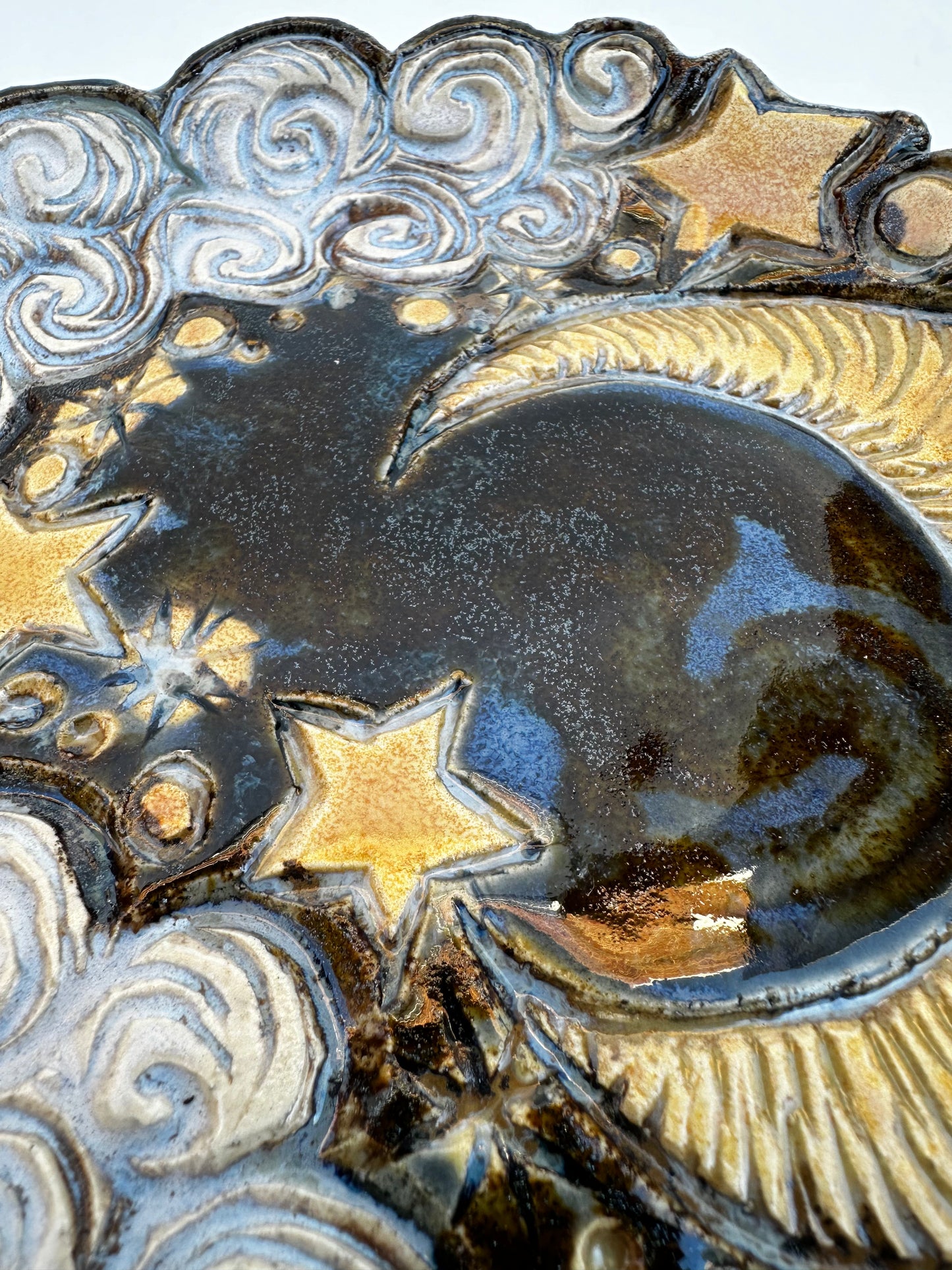 Small plate with moon, clouds, and stars