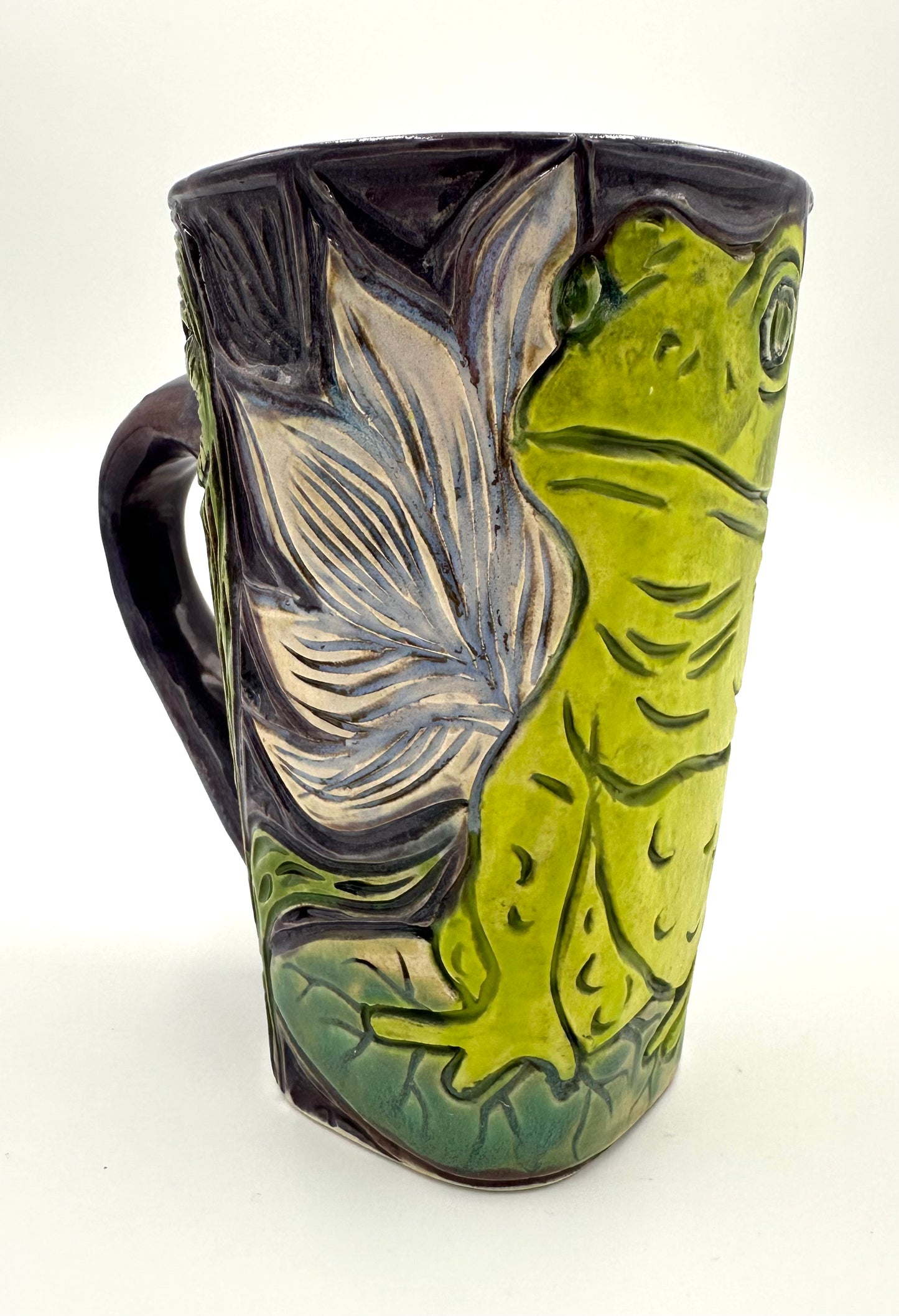 Toad on Lily pad with lotus flowers and pitcher plants Mug