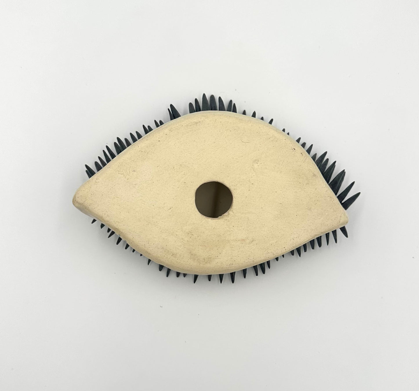 Eye wall hanging sculpture