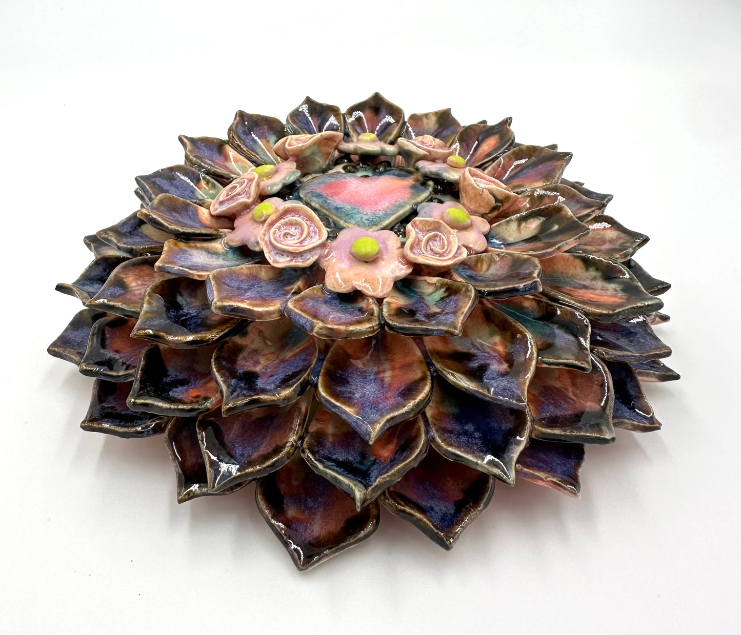 Purple and black heart zinnia wall hanging ceramic sculpture